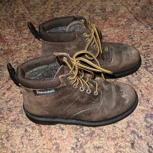 Dr. Martens thinsulate winter boots in brown. Size womens 7.